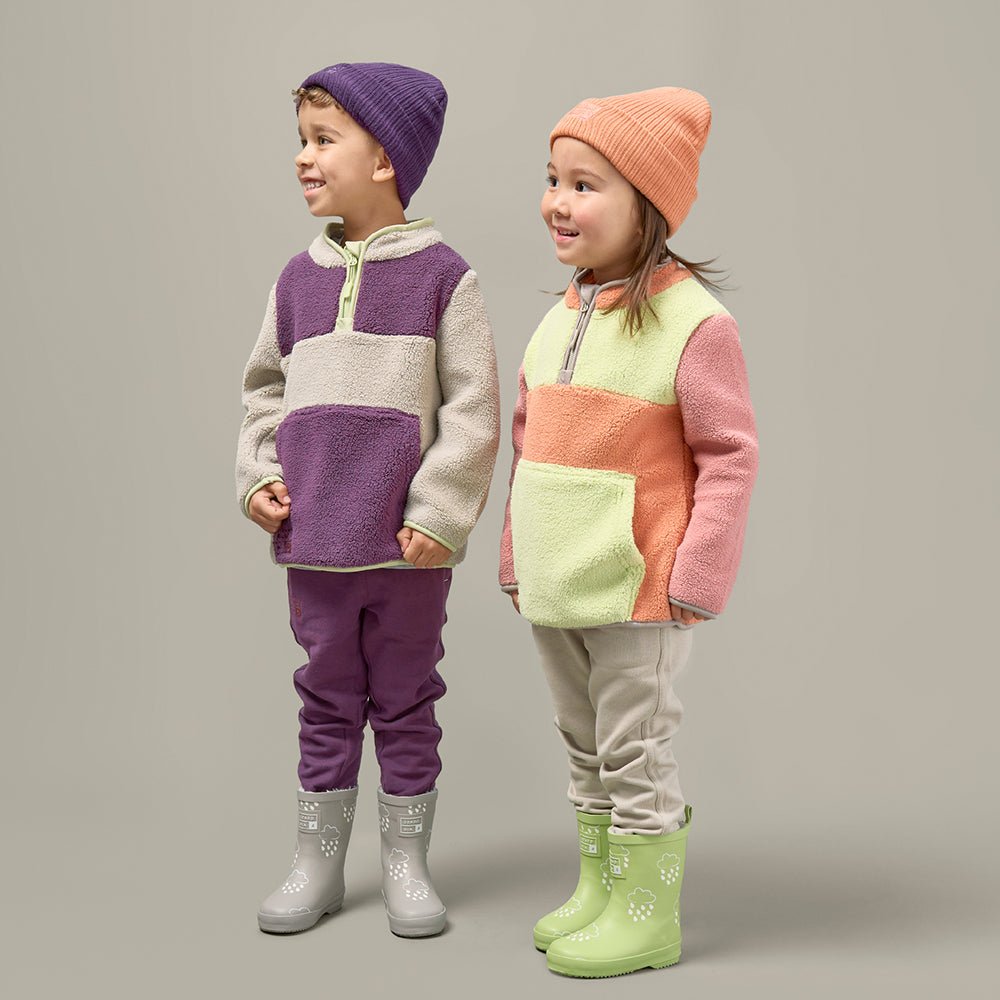 Kids outdoor playwear from Acorn & Pip: colorful outerwear perfect for outdoor adventures.