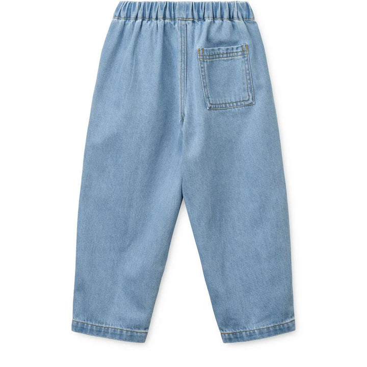Back view of Liewood children's denim pants in light denim, perfect for playful adventures. Acorn & Pip quality.