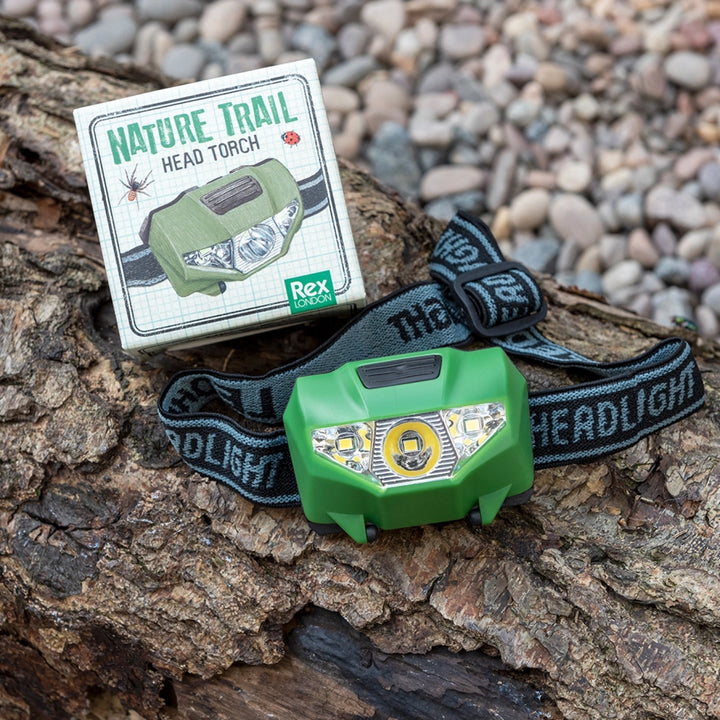 Rex Nature Trail green LED head torch on tree bark